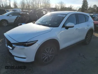 2018 Mazda CX-5 Grand Touring z VIN JM3KFBDM6J0337006, wystawiony jako Copart lot #87155694 z przebiegiem 50 643 mil mil oraz Szkody całkowita. Historia ofert i sprzedaży dostępna na DreamBid. Obrazek 1.