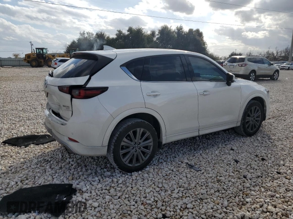 2024 Mazda CX-5 2.5 Turbo Signature with VIN JM3KFBXY7R0518304, listed as a Copart auction lot 42788985 with 8,593 mi miles and Salvage Title. Bid and sale history available at carsss.com. Image 3.