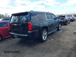 2015 Chevrolet Suburban LTZ with VIN 1GNSKKKC5FR255373, listed as a IAAI auction lot 42012528 with 219,030 mi miles and . Bid and sale history available at DreamBid. Image 4.