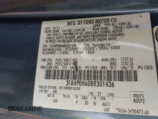 2011 Ford Fusion SE with VIN 3FAHP0HA0BR301436, listed as a IAAI auction lot 42035534 with 101,525 mi miles. Bid and sale history available at carsss.com. Image 9.