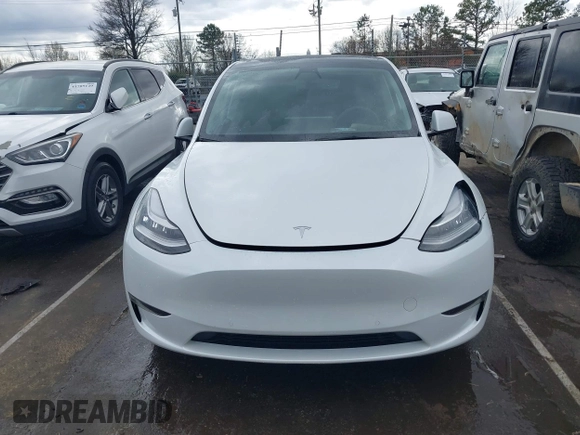 2022 Tesla Model Y Long Range with VIN 7SAYGDEE6NF461788, listed as a IAAI auction lot 41697064 with 34,034 mi miles and . Bid and sale history available at carsss.com. Image 11.