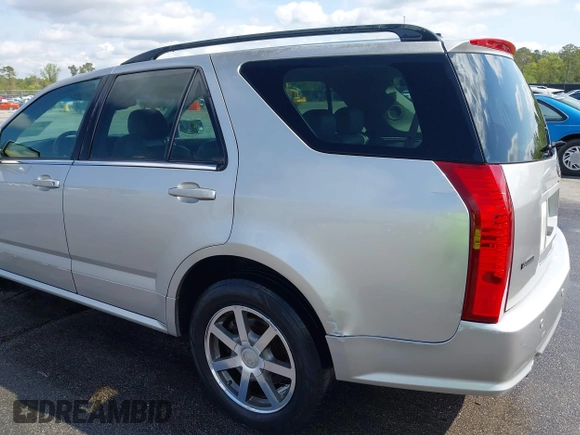 2004 Cadillac SRX with VIN 1GYDE63A740111607, listed as a IAAI auction lot 41918519 with 239,042 mi miles. Bid and sale history available at carsss.com. Image 6.