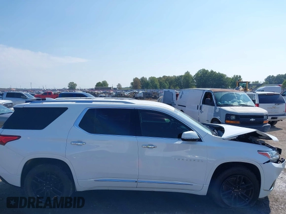2018 Chevrolet Traverse Premier z VIN 1GNERKKW6JJ220965, wystawiony jako IAAI lot #37625637 z przebiegiem 99 072 mil mil oraz . Historia ofert i sprzedaży dostępna na DreamBid. Obrazek 14.