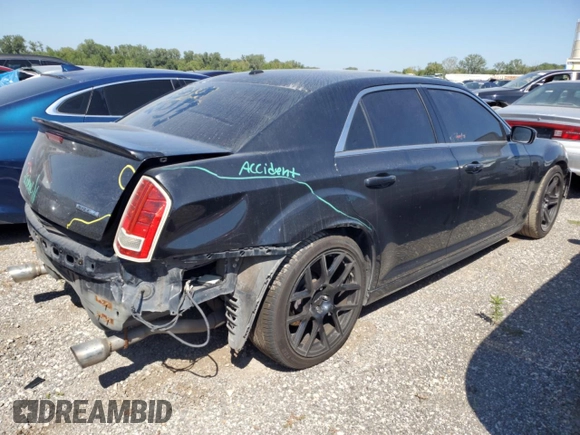 2013 Chrysler 300 SRT-8 with VIN 2C3CCAFJ9DH731557, listed as a Copart auction lot 69700344 with 174,242 mi miles and Salvage Title. Bid and sale history available at DreamBid. Image 3.