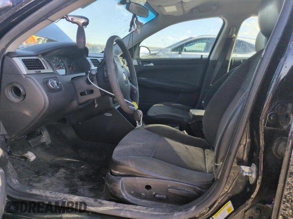 2013 Chevrolet Impala Police z VIN 2G1WD5E3XD1162414, wystawiony jako Copart lot #53910565 z przebiegiem 146 081 mil mil oraz Szkoda całkowita • Salvage title. Historia ofert i sprzedaży dostępna na DreamBid. Obrazek 7.
