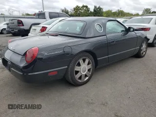 2005 Ford Thunderbird Deluxe z VIN 1FAHP60A55Y102032, wystawiony jako Copart lot #73761144 z przebiegiem 50 402 mil mil oraz Szkoda całkowita • Salvage title. Historia ofert i sprzedaży dostępna na DreamBid. Obrazek 3.