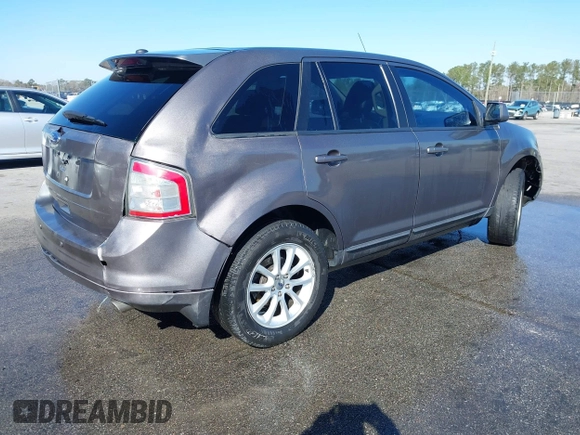 2010 Ford Edge SEL with VIN 2FMDK3JCXABA50115, listed as a IAAI auction lot 41758678 with 207,033 mi miles. Bid and sale history available at carsss.com. Image 4.