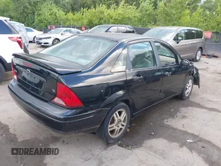 2000 Ford Focus SE with VIN 1FAFP3431YW182169, listed as a IAAI auction lot 42539335 with Not provided miles and . Bid and sale history available at DreamBid. Image 4.