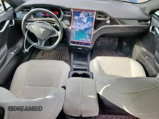 2018 Tesla Model S 75D с VIN 5YJSA1E26JF275221, выставлен на аукционе Copart как лот 61101885 с пробегом 122 530 миль миль и Списание • Salvage title. История ставок и продаж доступна на DreamBid. Изображение 8.