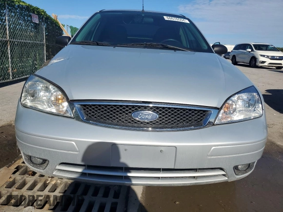 2006 Ford Focus S with VIN 1FAFP34N26W139281, listed as a Copart auction lot 44380565 with 120,860 mi miles and Salvage Title. Bid and sale history available at carsss.com. Image 5.