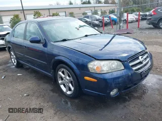 2003 Nissan Maxima GLE z VIN JN1DA31A03T412514, wystawiony jako IAAI lot #41856102 z przebiegiem 156 832 mil mil oraz . Historia ofert i sprzedaży dostępna na DreamBid. Obrazek 1.