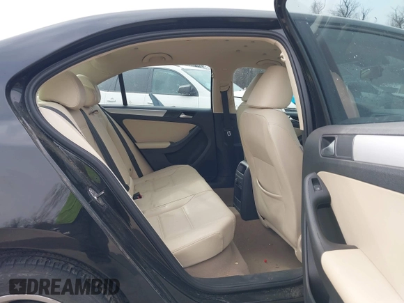 2012 Volkswagen Jetta TDI w/Premium with VIN 3VWLL7AJXCM073394, listed as a IAAI auction lot 41602574 with 159,668 mi miles and . Bid and sale history available at DreamBid. Image 8.