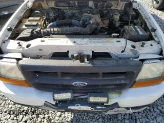 1999 Ford Ranger XL с VIN 1FTYR10V7XPC05195, выставлен на аукционе Copart как лот 65518915 с пробегом 222 046 миль миль и Чистый • Clean title. История ставок и продаж доступна на DreamBid. Изображение 11.