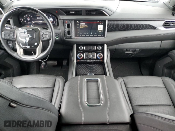 2023 GMC Yukon Denali with VIN 1GKS1DKL8PR402542, listed as a Copart auction lot 42001695 with 23,497 mi miles and Salvage Title. Bid and sale history available at carsss.com. Image 8.