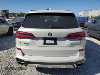 2019 BMW X5 xDrive40i with VIN 5UXCR6C50KLK86199, listed as a Copart auction lot 47523305 with 76,924 mi miles and Salvage Title. Bid and sale history available at DreamBid. Image 6.