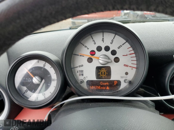 2012 MINI Convertible with VIN WMWZN3C58CT134224, listed as a Copart auction lot 57610015 with 141,394 mi miles and Salvage title. Bid and sale history available at DreamBid. Image 9.