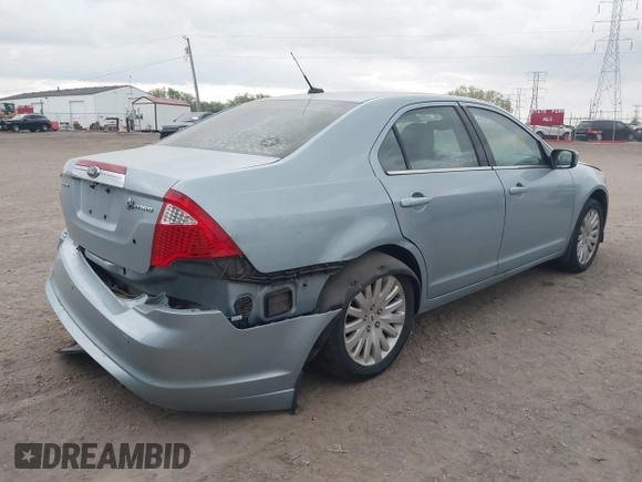 2010 Ford Fusion Hybrid z VIN 3FADP0L36AR200035, wystawiony jako IAAI lot #42145684 z przebiegiem 142 137 mil mil oraz . Historia ofert i sprzedaży dostępna na DreamBid. Obrazek 4.