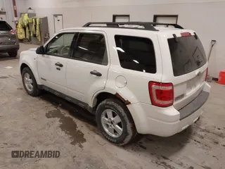 2008 Ford Escape XLT with VIN 1FMCU93128KA82058, listed as a IAAI auction lot 42005473 with 199,016 mi miles. Bid and sale history available at carsss.com. Image 3.