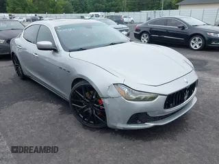 2015 Maserati Ghibli S Q4 z VIN ZAM57RTA2F1146411, wystawiony jako IAAI lot #42359547 z przebiegiem 95 937 mil mil oraz . Historia ofert i sprzedaży dostępna na DreamBid. Obrazek 1.