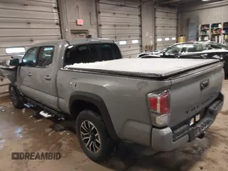 2021 Toyota Tacoma 4WD SR5 with VIN 3TMDZ5BNXMM111204, listed as a IAAI auction lot 41308159 with 46,024 mi miles. Bid and sale history available at carsss.com. Image 3.