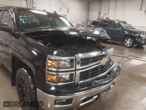 2015 Chevrolet Silverado 1500 LT with VIN 1GCVKREC2FZ417244, listed as a IAAI auction lot 41267554 with 87,735 mi miles and . Bid and sale history available at DreamBid. Image 18.