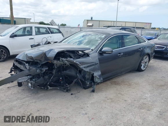2019 Jaguar XJ Portfolio with VIN SAJWA2G75K8W19401, listed as a IAAI auction lot 42214533 with 64,909 mi miles and . Bid and sale history available at DreamBid. Image 2.