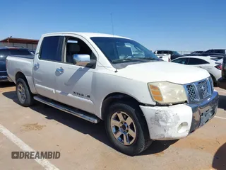 2007 Nissan Titan XE z VIN 1N6BA07A87N207203, wystawiony jako IAAI lot #42198617 z przebiegiem 293 603 mil mil oraz . Historia ofert i sprzedaży dostępna na DreamBid. Obrazek 1.