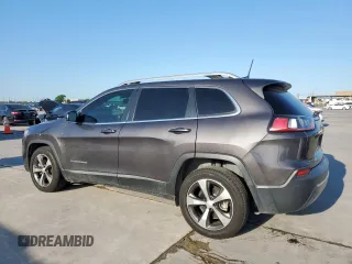 2019 Jeep Cherokee Limited z VIN 1C4PJLDB3KD275284, wystawiony jako Copart lot #51653855 z przebiegiem 124 079 mil mil oraz Czysty tytuł • Clean title. Historia ofert i sprzedaży dostępna na DreamBid. Obrazek 2.