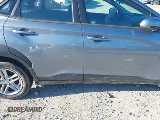 2021 Hyundai Kona SE with VIN KM8K12AA9MU667653, listed as a IAAI auction lot 41889973 with 30,399 mi miles and . Bid and sale history available at DreamBid. Image 13.
