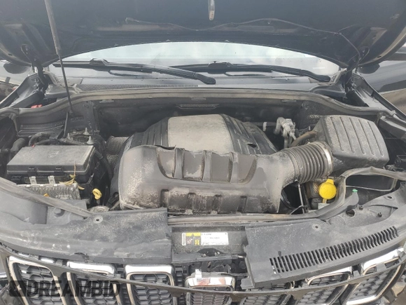 2018 Jeep Grand Cherokee Limited z VIN 1C4RJFBT8JC503564, wystawiony jako Copart lot #73991894 z przebiegiem 130 689 mil mil oraz Szkoda całkowita • Salvage title. Historia ofert i sprzedaży dostępna na DreamBid. Obrazek 13.