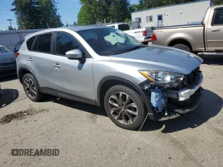 2016 Mazda CX-5 Grand Touring with VIN JM3KE4DY2G0764130, listed as a Copart auction lot 55350145 with 85,503 mi miles and Salvage Title. Bid and sale history available at carsss.com. Image 4.