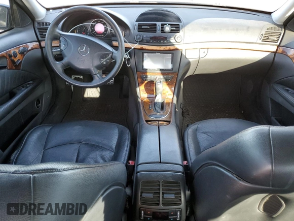2004 Mercedes-Benz E-Class 5.0L with VIN WDBUF70J64A585084, listed as a Copart auction lot 80297124 with 233,638 mi miles and Salvage Title. Bid and sale history available at carsss.com. Image 8.