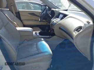 2015 Infiniti QX60 with VIN 5N1AL0MM6FC554039, listed as a IAAI auction lot 42055591 with 148,364 mi miles. Bid and sale history available at carsss.com. Image 5.