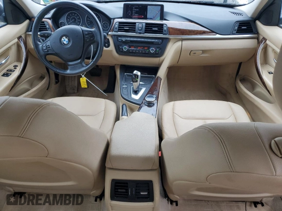 2014 BMW 3 Series 320i xDrive with VIN WBA3C3C51EF983592, listed as a Copart auction lot 60608765 with 195,061 mi miles and Salvage title. Bid and sale history available at DreamBid. Image 8.