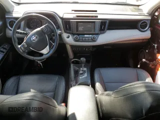 2018 Toyota RAV4 XLE with VIN 2T3RFREVXJW715931, listed as a Copart auction lot 48130715 with 106,324 mi miles and Salvage Title. Bid and sale history available at DreamBid. Image 8.
