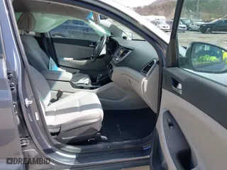 2016 Hyundai Tucson Sport with VIN KM8J33A2XGU022633, listed as a IAAI auction lot 41990348 with 73,395 mi miles. Bid and sale history available at carsss.com. Image 5.
