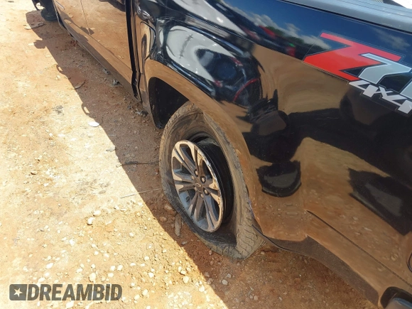 2022 Chevrolet Colorado 4WD Z71 z VIN 1GCGTDEN5N1327500, wystawiony jako IAAI lot #42265450 z przebiegiem 48 680 mil mil oraz . Historia ofert i sprzedaży dostępna na DreamBid. Obrazek 6.