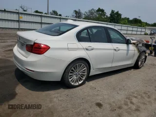 2013 BMW 3 Series 328i xDrive with VIN WBA3B5C55DF592149, listed as a Copart auction lot 59228605 with Not provided miles and Salvage title. Bid and sale history available at DreamBid. Image 3.