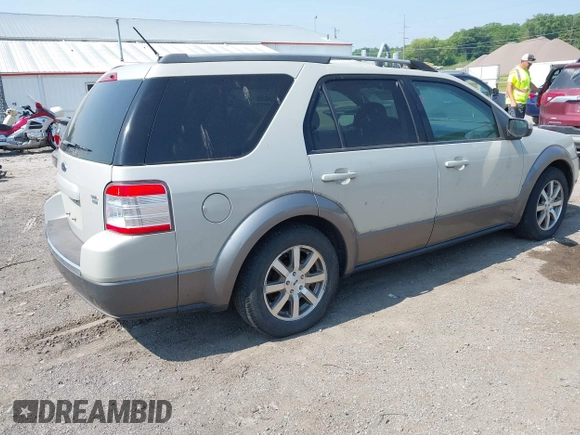 2008 Ford Taurus X SEL z VIN 1FMDK05W28GA04283, wystawiony jako IAAI lot #42478636 z przebiegiem 133 940 mil mil oraz . Historia ofert i sprzedaży dostępna na DreamBid. Obrazek 4.