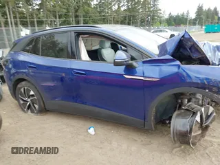 2022 Volkswagen ID.4 Pro S z VIN WVGGNPE26NP036269, wystawiony jako IAAI lot #42279904 z przebiegiem 43 959 mil mil oraz . Historia ofert i sprzedaży dostępna na DreamBid. Obrazek 14.