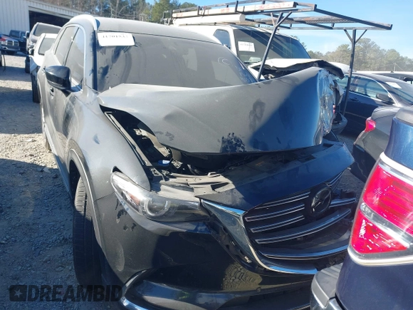 2020 Mazda CX-9 Grand Touring with VIN JM3TCADY8L0405173, listed as a IAAI auction lot 41701533 with 58,119 mi miles and . Bid and sale history available at DreamBid. Image 12.