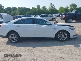 2015 Ford Taurus SEL with VIN 1FAHP2E97FG149657, listed as a IAAI auction lot 42400856 with 138,386 mi miles and . Bid and sale history available at DreamBid. Image 13.