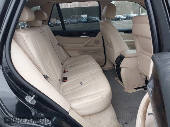 2014 BMW X5 xDrive35i z VIN 5UXKR0C51E0H26528, wystawiony jako IAAI lot #42027626 z przebiegiem 87 228 mil mil oraz . Historia ofert i sprzedaży dostępna na DreamBid. Obrazek 8.