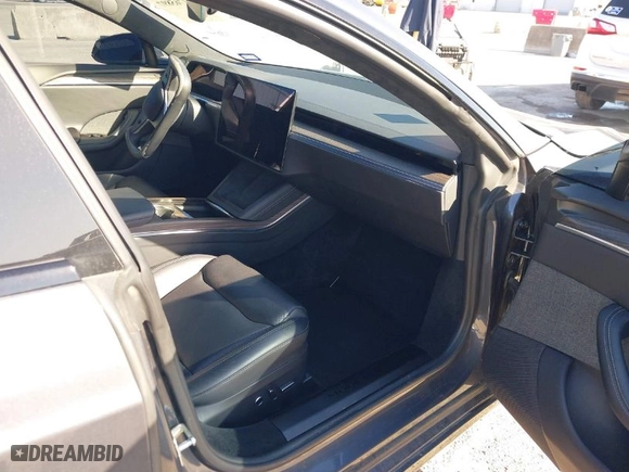 2022 Tesla Model S with VIN 5YJSA1E57NF467229, listed as a IAAI auction lot 41765897 with 1 mi miles. Bid and sale history available at carsss.com. Image 5.