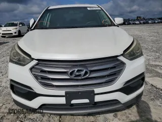 2017 Hyundai Santa Fe 2.4L z VIN 5XYZT3LB8HG434749, wystawiony jako Copart lot #60261275 z przebiegiem 128 099 mil mil oraz Czysty tytuł • Clean title. Historia ofert i sprzedaży dostępna na DreamBid. Obrazek 5.