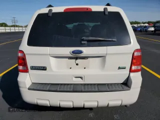 2010 Ford Escape XLT с VIN 1FMCU9DG0AKC78735, выставлен на аукционе Copart как лот 58376425 с пробегом 213 183 миль миль и Списание • Salvage title. История ставок и продаж доступна на DreamBid. Изображение 6.