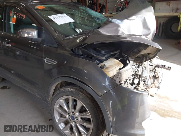 2016 Ford Escape SE with VIN 1FMCU9G93GUA33373, listed as a IAAI auction lot 41739890 with Not Provided miles and . Bid and sale history available at DreamBid. Image 6.