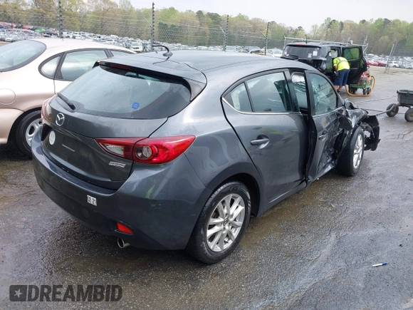 2014 Mazda 3 i Touring with VIN JM1BM1L76E1184728, listed as a IAAI auction lot 41962258 with 200,544 mi miles and . Bid and sale history available at DreamBid. Image 4.