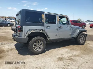 2014 Jeep Wrangler Unlimited Rubicon with VIN 1C4HJWFG1EL241014, listed as a Copart auction lot 63948655 with 165,650 mi miles and Salvage title. Bid and sale history available at DreamBid. Image 3.