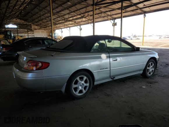 2002 Toyota Solara SE with VIN 2T1FF28PX2C580985, listed as a Copart auction lot 83092354 with 264,668 mi miles and Salvage Title. Bid and sale history available at DreamBid. Image 3.